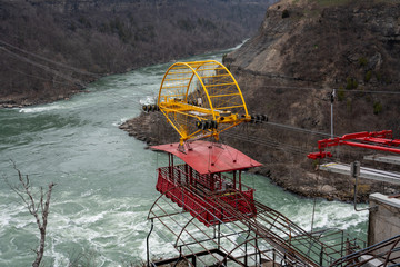 Image of a Tourist Tram Suspended Above a Beautiful River in Niagara Falls, Ontario