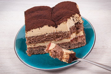 Tiramisu cake with different layers. Delicious dessert for celebrations