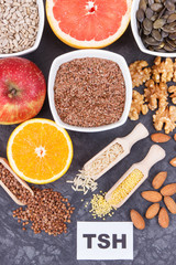 Inscription TSH with nutritious products and ingredients containing vitamins for healthy thyroid