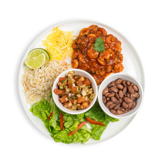A bowl of Mexican chicken shrimp served with beans, rise and tomato salsa isolated on white