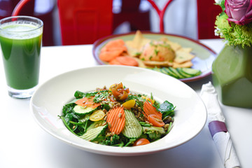 fresh salad with carrots and cucumber