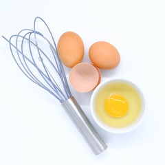 Close-up view of raw chicken eggs on background