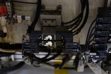 Fototapeta premium Solenoid valve pneumatic equipment for machine in the factory 