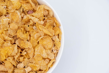 cereal in a white bowl on white background. Healthy breakfast concept.