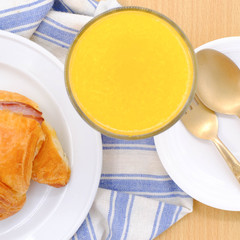 Breakfast served with croissants. Balanced diet.
