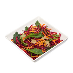 Beetroot and Carrot salad with spinach  isolated on white 