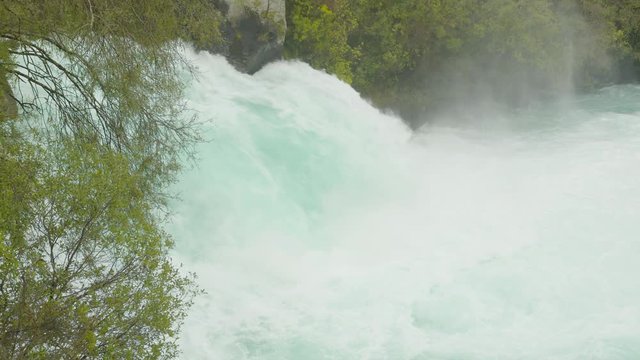 Huka Falls on the Waikato River that drains Lake Taupo in New Zealand // To the side and in front of the falls - Static Shot
