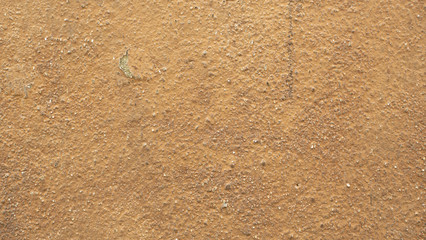 Brown and black stains on the rough surfaces of concrete, Abstract background and cracked wall texture