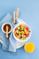 Bowl of summer Fruit salad with melon and watermelon 
