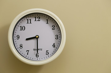 Wall clock time of the room is 8:30