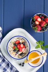 Bircher muesli or oats with fresh berries 