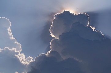 blue sky with sun ray and beautiful clouds