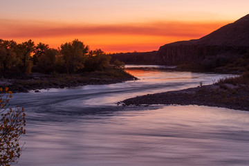 River winding through the landscape during sunset