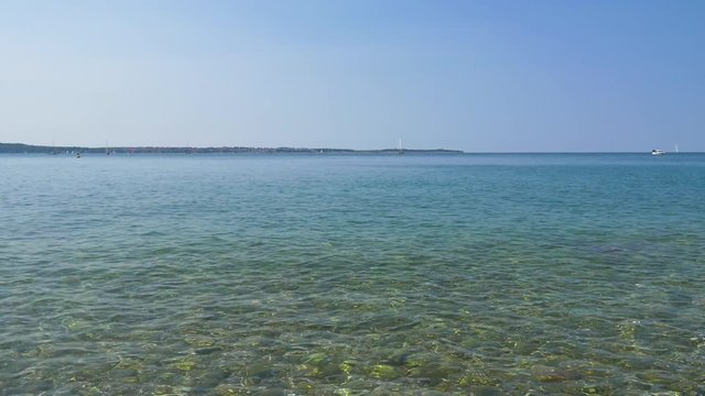 Adriatic sea view from Slovenian coast to Croatian coast with blue and green water