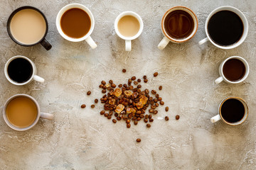 Lots of coffee on beige background from above