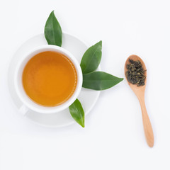 cup with tea and teapot on white background, over light
