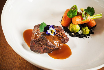 steak with vegetables and microgreens