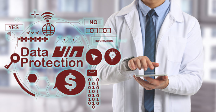 Male doctor with tablet computer and hologram projection of data protection service in office