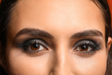 Young woman with beautiful makeup, closeup