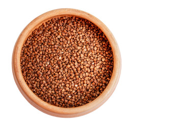 A bowl of refined uncooked buckwheat on a white background with available space for text.
