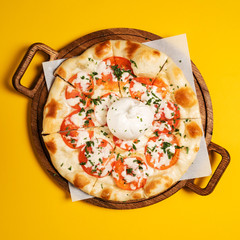 vegetarian pizza with tomato and mozzarella