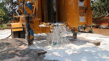 Fototapeta na wymiar The machine is drilling artesian wells