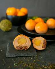 Piece of French Mousse Mini Desserts Mandarin Shape