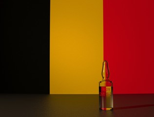 COVID 19 virus vaccine against the backdrop of the Belgium flag. Close-up.