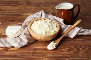 Different dairy products on wooden background