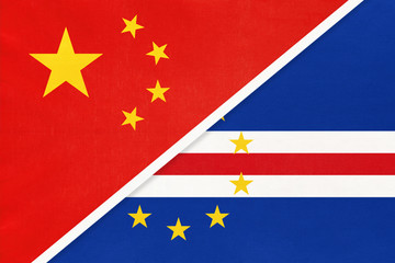 China or PRC vs Cape Verde national flag from textile. Relationship between Asian and African countries.
