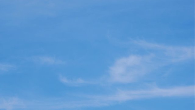 moving white cloud with  blue sky background at day time