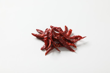 Dried red chili or chilli cayenne pepper isolated on white background.