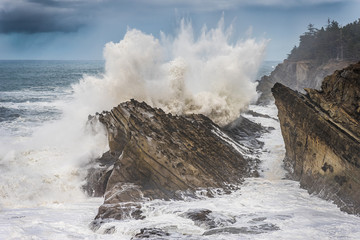 waves crashing on rocks