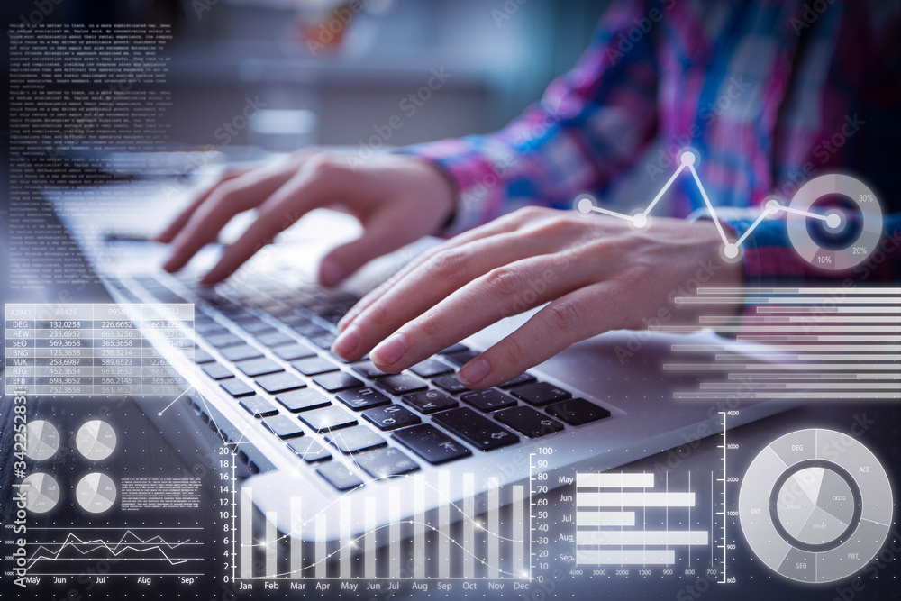 Fototapete manager typing on laptop and virtual statistic graphics. cropped view of close-up person hands using