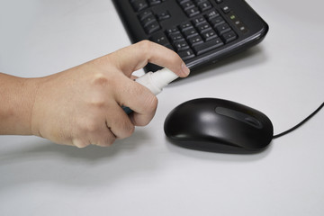 Clean before touching the mouse or office equipment  with alcohol spray to prevent Covid-19 (Coronavirus).
