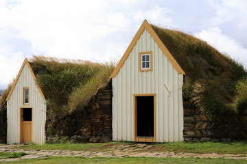 Fototapeta na wymiar Akureyri / Iceland - August 26, 2017: Typical houses in Laufas Folk museum area, Iceland, Europe