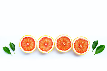 High vitamin C. Juicy grapefruit slices on white background. Top view