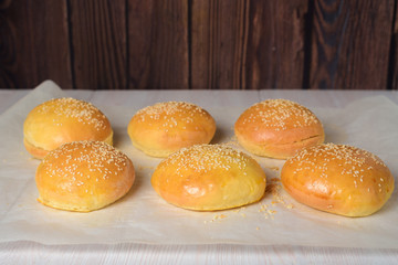 Burger rolls on a wooden background. copycpase . close-up.