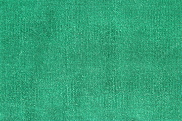 Green linen fabric cotton for wallpaper design. Brown weave cotton background texture.