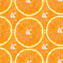 Seamless pattern of juicy slices of orange in the form of tiles. Design for packaging and...