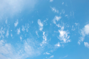 Fototapeta na wymiar Blurred white clouds on the sky background.