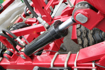 Power hydraulic cylinder lifting plow.