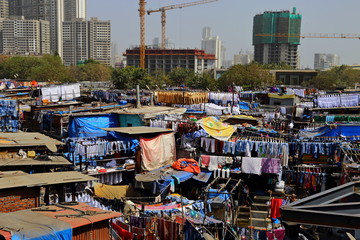 MUMBAI, INDIA - February 7, 2019: Dhobi Ghat open air laundry next to Mahalaxmi station, the largest of its kind in the world,