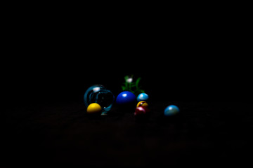 marbles on black background