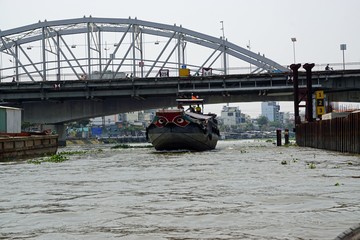 ships on nha ben river in ho chi minh city