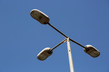 Close-up street lamp on blue sky

