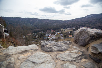 Fototapeta premium The view into the valley of the Zittau mountains from the castle Oybin to the village Olbersdorf/Hain and the Czech Republic.