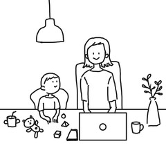 自宅でパソコンをする母親と小さい息子