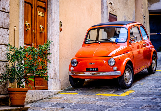 Verona, Italy - August 21: famous old fiat 500 cinquencento at the old town of verona on August 21, 2014