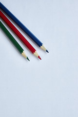 A pencil on a white surface